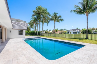 This stunning 5 BD/5.5 BA single-story home, crafted by custom on St. Andrews Country Club of Boca Raton in Florida - for sale on GolfHomes.com, golf home, golf lot