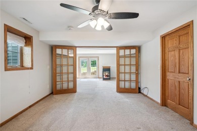 Welcome to a home where elegance meets everyday comfort on Brown Deer Golf Club in Iowa - for sale on GolfHomes.com, golf home, golf lot