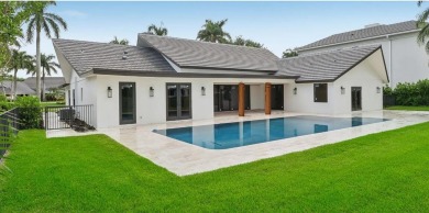 This stunning 5 BD/5.5 BA single-story home, crafted by custom on St. Andrews Country Club of Boca Raton in Florida - for sale on GolfHomes.com, golf home, golf lot