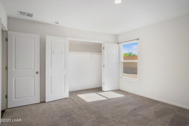 Discover this immaculate, nearly new home in Bullhead City's on Chaparral Golf and Country Club in Arizona - for sale on GolfHomes.com, golf home, golf lot