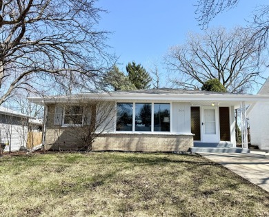 Your new home is a charming ranch nestled in a great on Currie Park Golf Club in Wisconsin - for sale on GolfHomes.com, golf home, golf lot