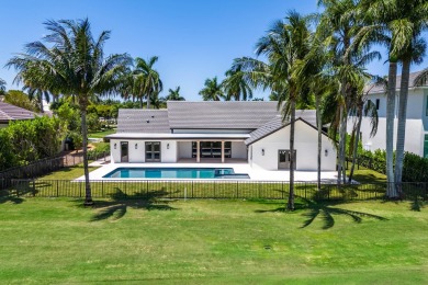 This stunning 5 BD/5.5 BA single-story home, crafted by custom on St. Andrews Country Club of Boca Raton in Florida - for sale on GolfHomes.com, golf home, golf lot