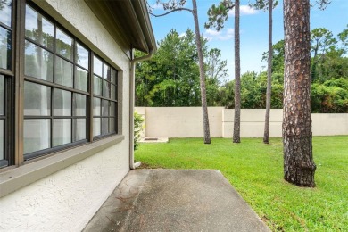 UPDATED END UNIT VILLA - FURNISHED  TURNKEY - LOCATED IN on Timber Pines Golf Course in Florida - for sale on GolfHomes.com, golf home, golf lot