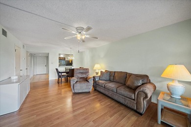 Under contract-accepting backup offers. Enjoy stunning lake on The Meadows Golf and Country Club in Florida - for sale on GolfHomes.com, golf home, golf lot