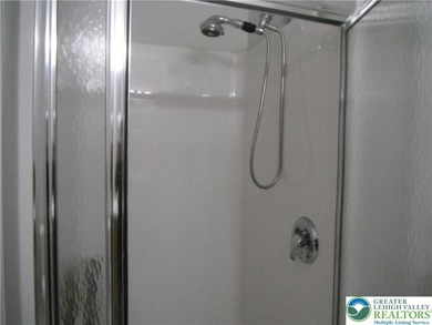 Easy living at Morgan Hill. This 2 bedroom 2 full bath condo on The Club At Morgan Hill in Pennsylvania - for sale on GolfHomes.com, golf home, golf lot