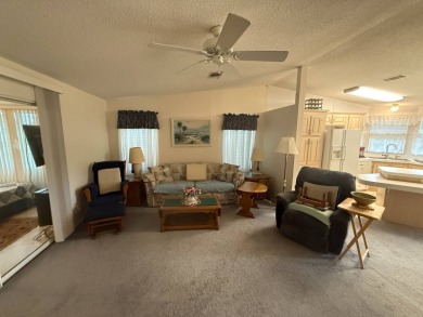 This well loved 2-bedroom, 2-bathroom Palm Harbor home is being on Del Tura Golf and Country Club in Florida - for sale on GolfHomes.com, golf home, golf lot
