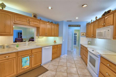 Under contract-accepting backup offers. TEE TIME? YES! The green on Lake Bess Golf Club in Florida - for sale on GolfHomes.com, golf home, golf lot