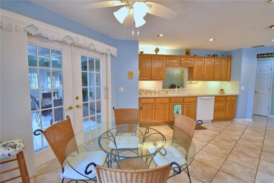 Under contract-accepting backup offers. TEE TIME? YES! The green on Lake Bess Golf Club in Florida - for sale on GolfHomes.com, golf home, golf lot