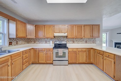 Coastal Living on the Golf Course! Nestled in the highly on Beau Rivage Golf and Resort in North Carolina - for sale on GolfHomes.com, golf home, golf lot