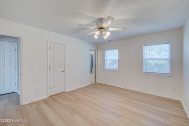 Coastal Living on the Golf Course! Nestled in the highly on Beau Rivage Golf and Resort in North Carolina - for sale on GolfHomes.com, golf home, golf lot