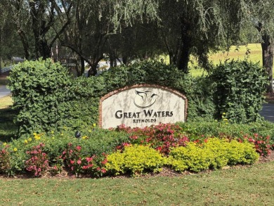 Very nice gentle slope building site offering great location and on Great Waters Course At Reynolds Plantation in Georgia - for sale on GolfHomes.com, golf home, golf lot