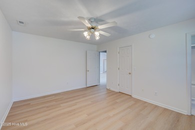 Coastal Living on the Golf Course! Nestled in the highly on Beau Rivage Golf and Resort in North Carolina - for sale on GolfHomes.com, golf home, golf lot