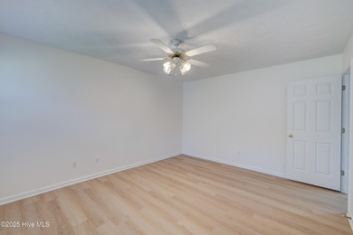 Coastal Living on the Golf Course! Nestled in the highly on Beau Rivage Golf and Resort in North Carolina - for sale on GolfHomes.com, golf home, golf lot