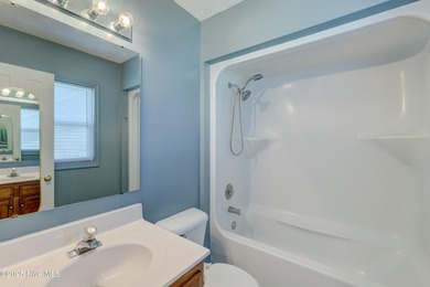 Coastal Living on the Golf Course! Nestled in the highly on Beau Rivage Golf and Resort in North Carolina - for sale on GolfHomes.com, golf home, golf lot