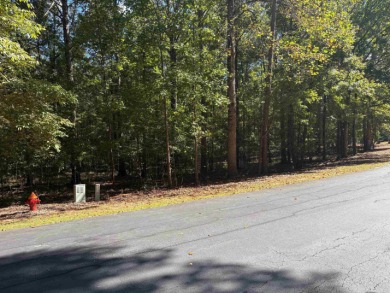Very nice gentle slope building site offering great location and on Great Waters Course At Reynolds Plantation in Georgia - for sale on GolfHomes.com, golf home, golf lot