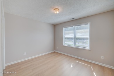 Coastal Living on the Golf Course! Nestled in the highly on Beau Rivage Golf and Resort in North Carolina - for sale on GolfHomes.com, golf home, golf lot