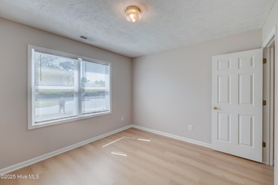 Coastal Living on the Golf Course! Nestled in the highly on Beau Rivage Golf and Resort in North Carolina - for sale on GolfHomes.com, golf home, golf lot