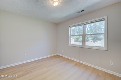 Coastal Living on the Golf Course! Nestled in the highly on Beau Rivage Golf and Resort in North Carolina - for sale on GolfHomes.com, golf home, golf lot