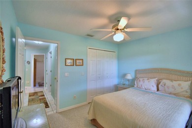 Under contract-accepting backup offers. TEE TIME? YES! The green on Lake Bess Golf Club in Florida - for sale on GolfHomes.com, golf home, golf lot