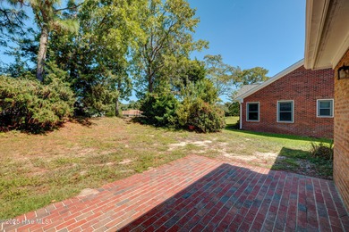 Coastal Living on the Golf Course! Nestled in the highly on Beau Rivage Golf and Resort in North Carolina - for sale on GolfHomes.com, golf home, golf lot