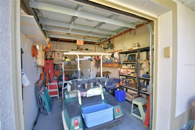 Under contract-accepting backup offers. TEE TIME? YES! The green on Lake Bess Golf Club in Florida - for sale on GolfHomes.com, golf home, golf lot