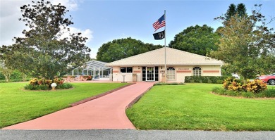 Under contract-accepting backup offers. TEE TIME? YES! The green on Lake Bess Golf Club in Florida - for sale on GolfHomes.com, golf home, golf lot