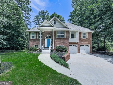 Welcome to this charming 5-bedroom, 3-bath brick home situated on Fairfield Plantation Golf and Country Club in Georgia - for sale on GolfHomes.com, golf home, golf lot