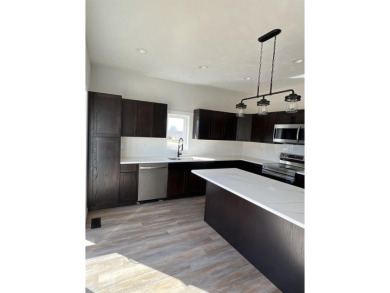 Let's take a look at this new build in Akron, Iowa. This on Akron Golf Course in Iowa - for sale on GolfHomes.com, golf home, golf lot