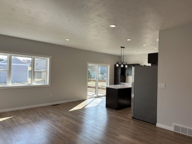 Let's take a look at this new build in Akron, Iowa. This on Akron Golf Course in Iowa - for sale on GolfHomes.com, golf home, golf lot
