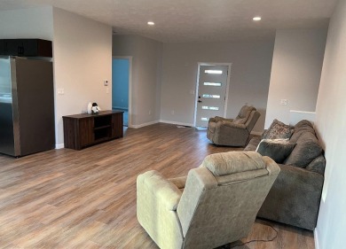 Let's take a look at this new build in Akron, Iowa. This on Akron Golf Course in Iowa - for sale on GolfHomes.com, golf home, golf lot