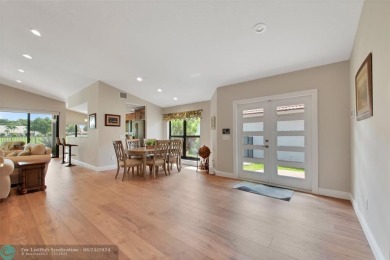 Charming 2-bedroom, 2-bath single-family home offers an array of on Boca Woods Country Club in Florida - for sale on GolfHomes.com, golf home, golf lot