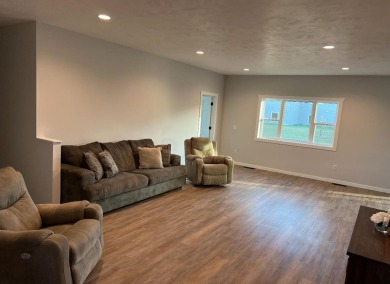 Let's take a look at this new build in Akron, Iowa. This on Akron Golf Course in Iowa - for sale on GolfHomes.com, golf home, golf lot