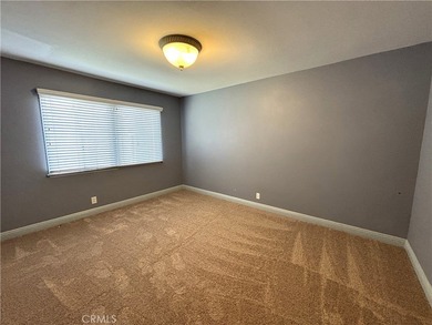 This wonderfully located home is in the desirable El Dorado Park on El Dorado Park Golf Course in California - for sale on GolfHomes.com, golf home, golf lot