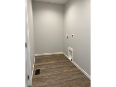 Let's take a look at this new build in Akron, Iowa. This on Akron Golf Course in Iowa - for sale on GolfHomes.com, golf home, golf lot