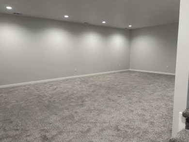 Let's take a look at this new build in Akron, Iowa. This on Akron Golf Course in Iowa - for sale on GolfHomes.com, golf home, golf lot