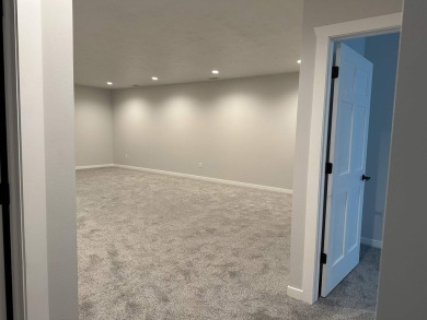 Let's take a look at this new build in Akron, Iowa. This on Akron Golf Course in Iowa - for sale on GolfHomes.com, golf home, golf lot