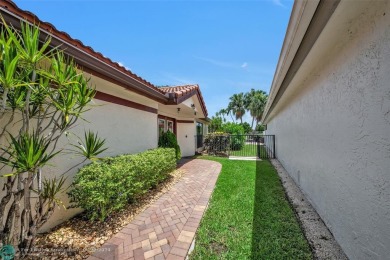 Charming 2-bedroom, 2-bath single-family home offers an array of on Boca Woods Country Club in Florida - for sale on GolfHomes.com, golf home, golf lot