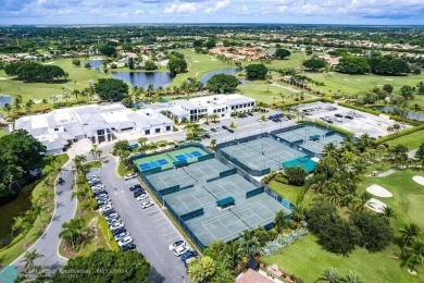 Charming 2-bedroom, 2-bath single-family home offers an array of on Boca Woods Country Club in Florida - for sale on GolfHomes.com, golf home, golf lot