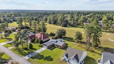 Stunningly shiny and glistening home on the former Shoreline on Harbour Point Golf Club in North Carolina - for sale on GolfHomes.com, golf home, golf lot