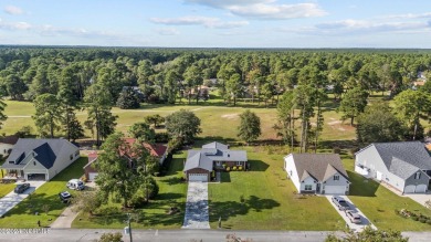 Stunningly shiny and glistening home on the former Shoreline on Harbour Point Golf Club in North Carolina - for sale on GolfHomes.com, golf home, golf lot