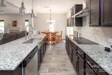 Welcome to Tillery Tradition! This beautiful 2019-built 2-story on The Tillery Tradition Country Club in North Carolina - for sale on GolfHomes.com, golf home, golf lot