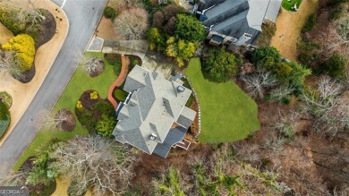 Introducing a triumph of luxury yet a warm, cozy home featured on TPC At Sugarloaf Golf Club in Georgia - for sale on GolfHomes.com, golf home, golf lot
