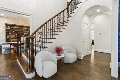 Introducing a triumph of luxury yet a warm, cozy home featured on TPC At Sugarloaf Golf Club in Georgia - for sale on GolfHomes.com, golf home, golf lot