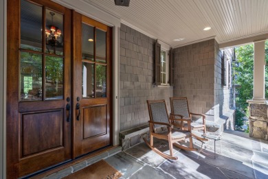 Lakefront retreat o Sunset views o Two outdoor kitchens o Steps on Reynolds Lake Oconee - The Oconee in Georgia - for sale on GolfHomes.com, golf home, golf lot