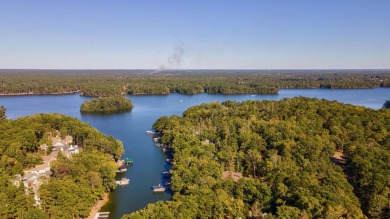 Lakefront retreat o Sunset views o Two outdoor kitchens o Steps on Reynolds Lake Oconee - The Oconee in Georgia - for sale on GolfHomes.com, golf home, golf lot