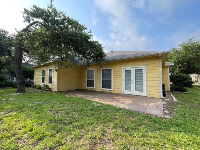 Welcome to this spacious Heron's Roost retreat under the trees! on Rockport Country Club in Texas - for sale on GolfHomes.com, golf home, golf lot