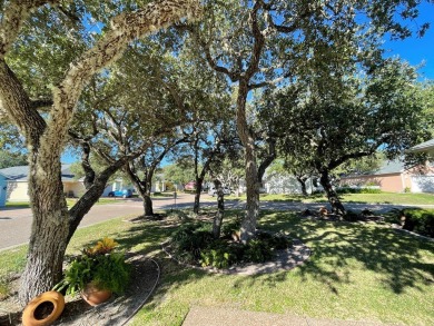 Welcome to this spacious Heron's Roost retreat under the trees! on Rockport Country Club in Texas - for sale on GolfHomes.com, golf home, golf lot