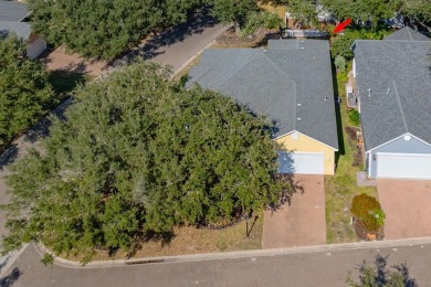 Welcome to this spacious Heron's Roost retreat under the trees! on Rockport Country Club in Texas - for sale on GolfHomes.com, golf home, golf lot