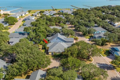 Welcome to this spacious Heron's Roost retreat under the trees! on Rockport Country Club in Texas - for sale on GolfHomes.com, golf home, golf lot