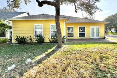 Welcome to this spacious Heron's Roost retreat under the trees! on Rockport Country Club in Texas - for sale on GolfHomes.com, golf home, golf lot